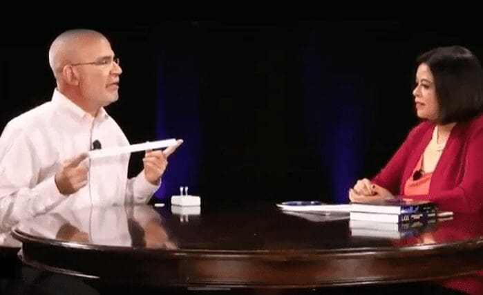 Steve Paolini showing LED technology to Kamla Bhatt