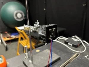 Laboratory testing set up for measurement of light characteristics, including an integrating sphere which measure light flux in lumens.
